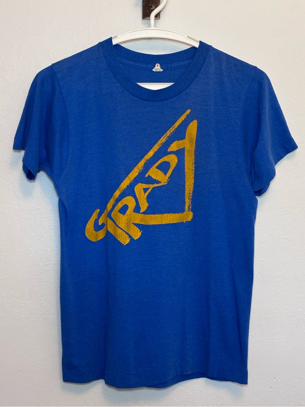 Vintage Screen Stars Blue Graphic Tee with “Grady” Gold Text. Mens S.